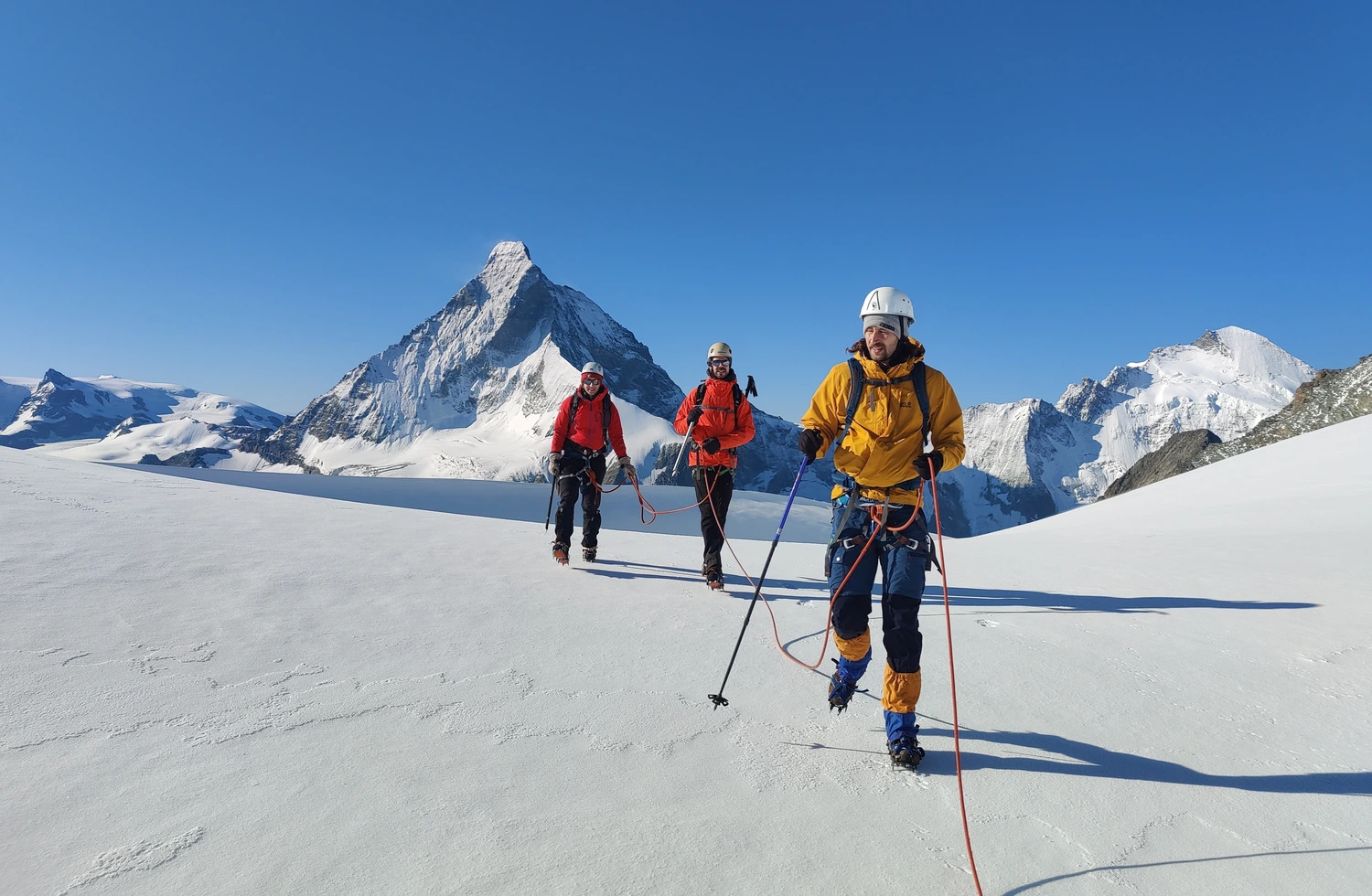 In front of the Matterhorn with the real climber: my sister.